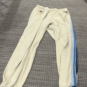 tiny stain and very small hole in back (all shown in pic)